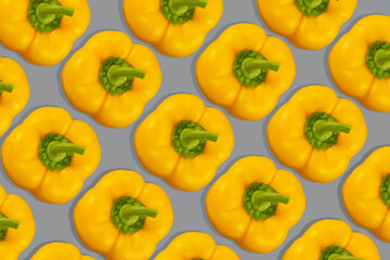 Sweet yellow bell peppers isolated on Ultimate Gray background. Trendy colors of the year 2021 - Gray and Yellow.