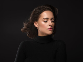 Beautiful woman portrait face over black background