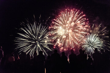 Crowd watching fireworks and celebrating new year