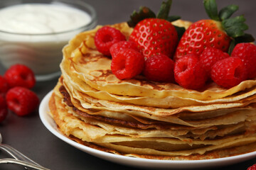 Russian cuisine national dish bliny with fresh berries