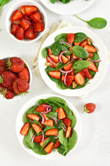 Fruit salad with strawberry and spinach