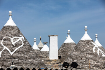 Stone roof of Trulli House in Alberobello, Italy. The style of construction is specific to the...