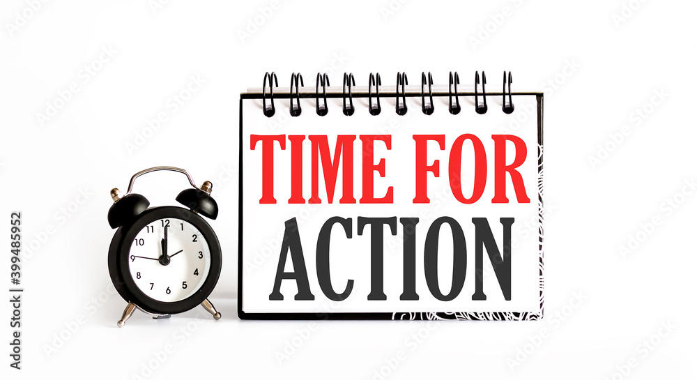 Fototapete time for action notepad writing on white background with alarm clock