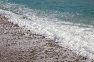 waves on the beach after rain
