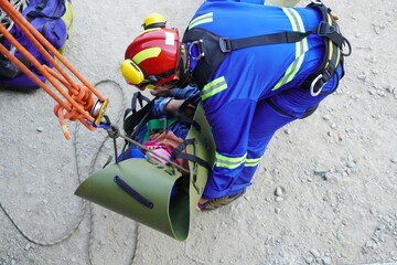 Sked stretches encapsulate injured workers to take off scaffolding in working at heights and...