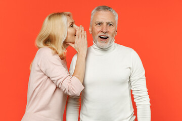 Excited couple friends elderly gray-haired man blonde woman wearing white pink casual clothes...