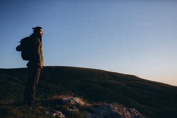 Fototapeta premium A man in nature. Seeker of adventures