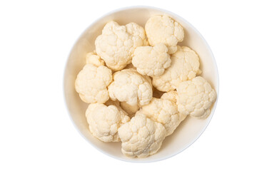Pieces of cauliflower in the bowl isolated on white background, top view.