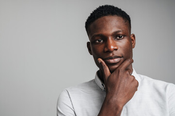 Closeup portrait of young african man thinking deeply