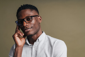 Confident young african man wearing smart white shirt