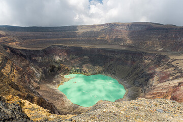 Volcano with green crater lake - obrazy, fototapety, plakaty