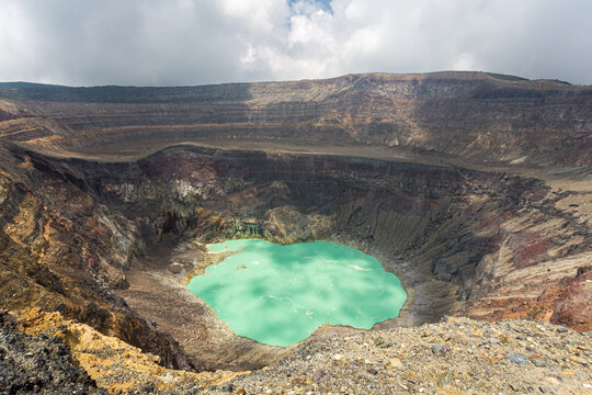 Volcano with green crater lake