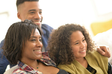 Portrait of happy african-american family of three