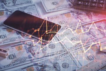 Double exposure of forex graph drawing over us dollars bill background. Concept of financial markets.