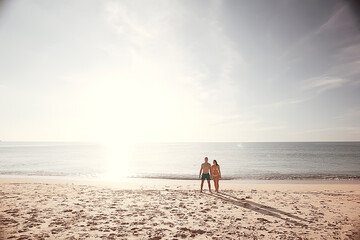 beach sea lovers / guy and girl relaxing in the summer on the sea coast, the concept of summer holidays, a vacation at sea