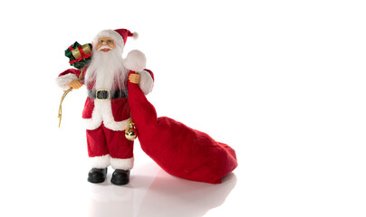 Santa Claus with a huge bag on the run to delivery christmas gifts