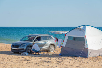 Camping by the sea. Family vacation at the sea. Wild beaches of the Krasnodar Territory.