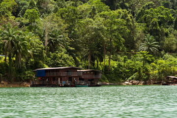 Kenyir, Malaysia - July 22, 2020: Houseboat is anchored in Kenyir Lake. Malaysia tourist attraction both for local and international.