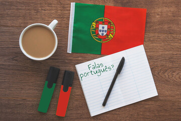 portugal national flag, notebook to write foreign words, inscription speak portuguese in...