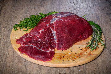 Arabic food, raw meat on wood, complex menu 