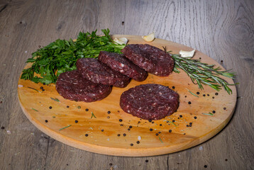 Arabic food, raw meat on wood, complex menu 