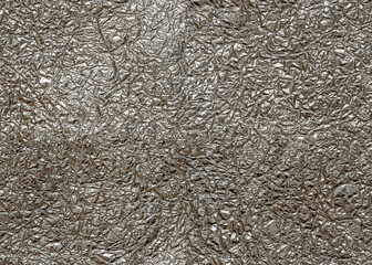 Seamless wrinkled metal foil texture, silver color, grunge abstract background.