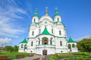 Fototapeta na wymiar Beautiful white green-domed orthodox church in Ukrainian town of Kozelets