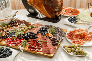 Table with different sweets food and snacks on event catering. Buffet snack