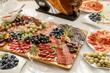 Table with different sweets food and snacks on event catering. Buffet snack