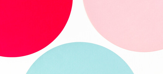 Abstract color paper background. Pastel blue, pink and red color round circle shape geometry composition on white background. Top view