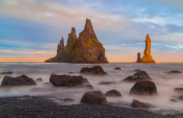 Amazing landscape with basalt rock formations Troll toes (Trolls fingers) on Black Beach. Ocean...