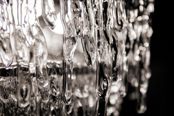 Frozen or frozen water as a decorative element on a black background