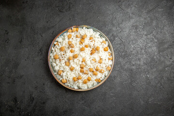 Easy-make ahead peas and rice meal for dinner on dark background