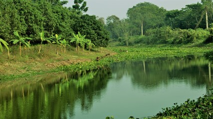 LANDSCAPE OF CHURNI RIVER AT KHANTURA GAZNA  AND FISHER MAN