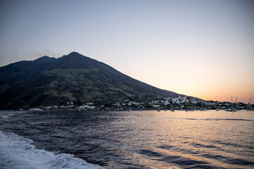 Lighthouse overlooking the sea, on an old inactive volcano, called Strombolicchio. The sunset...