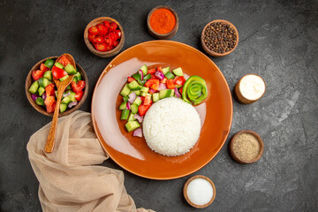 Above view of healthy meal on dark background