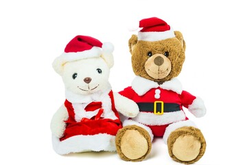 Couple teddy bear doll wearing santa set sitting isolated on white background,Christmas day and New Year's gifts