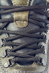 Close-up of lacing on brown leather shoes