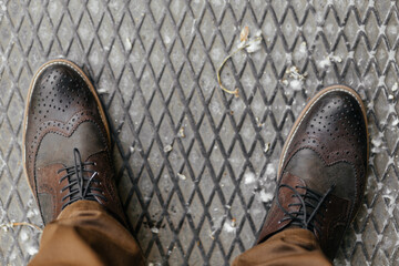 Photo From above, men's brown leather shoes. Fashion style. High quality photo