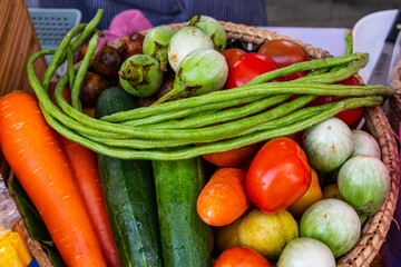 a colorful selection of Thai vegetables for sale on the street