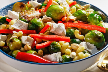 macaroni salad with broccoli sprouts, top view