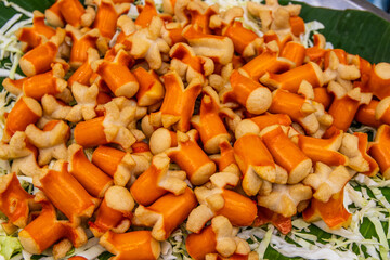 thai sausage dish for sale on the street