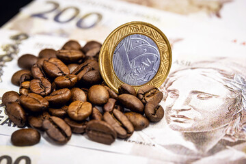 coffee from brazil, with brazilian money in the background. Concept of high quality coffee for export.