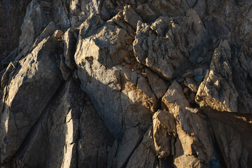 Texture of rocky hill during sunset