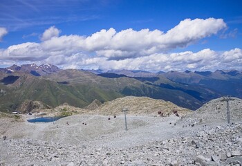 A cable car near a lake in the Italian Alps (Trentino, Italy, Europe)