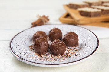 Chocolate ball cake with cocoa powder