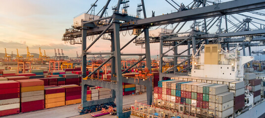 crane loading cargo container to container ship in the international terminal yard port  concept...