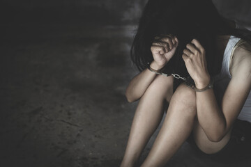 The slave girl was handcuffed and kept. Women violence and abused concept,  human trafficking...