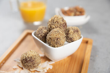 Cake balls with almonds, biscuits and orange juice