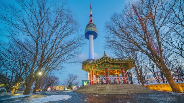 Time lapse 4k Winter snow of Seoul tower at namsan mountain in South Korea.